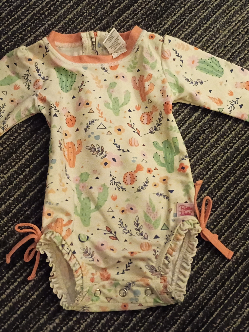 Ruffle Butts Cream Cactus Print Long-Sleeve One-Piece with Peach Trim